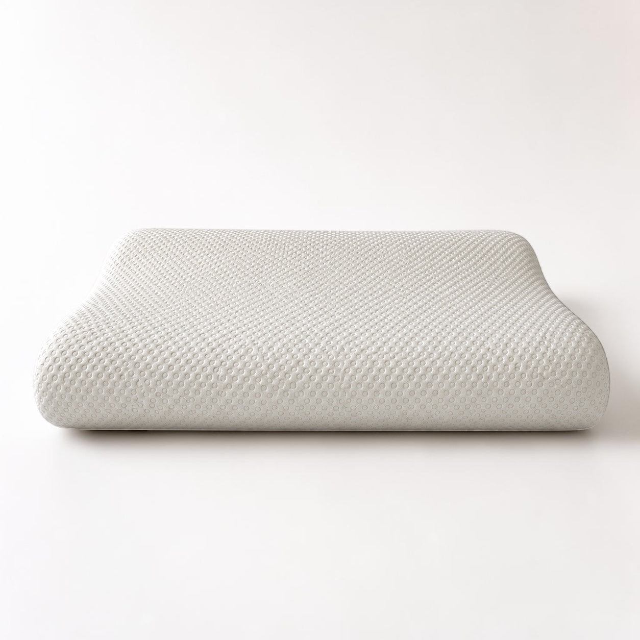 Unaluna Biocool Contour Pude i hvid med OEKO-TEX certificering. Ergonomisk hovedpude med to højder for optimal støtte.